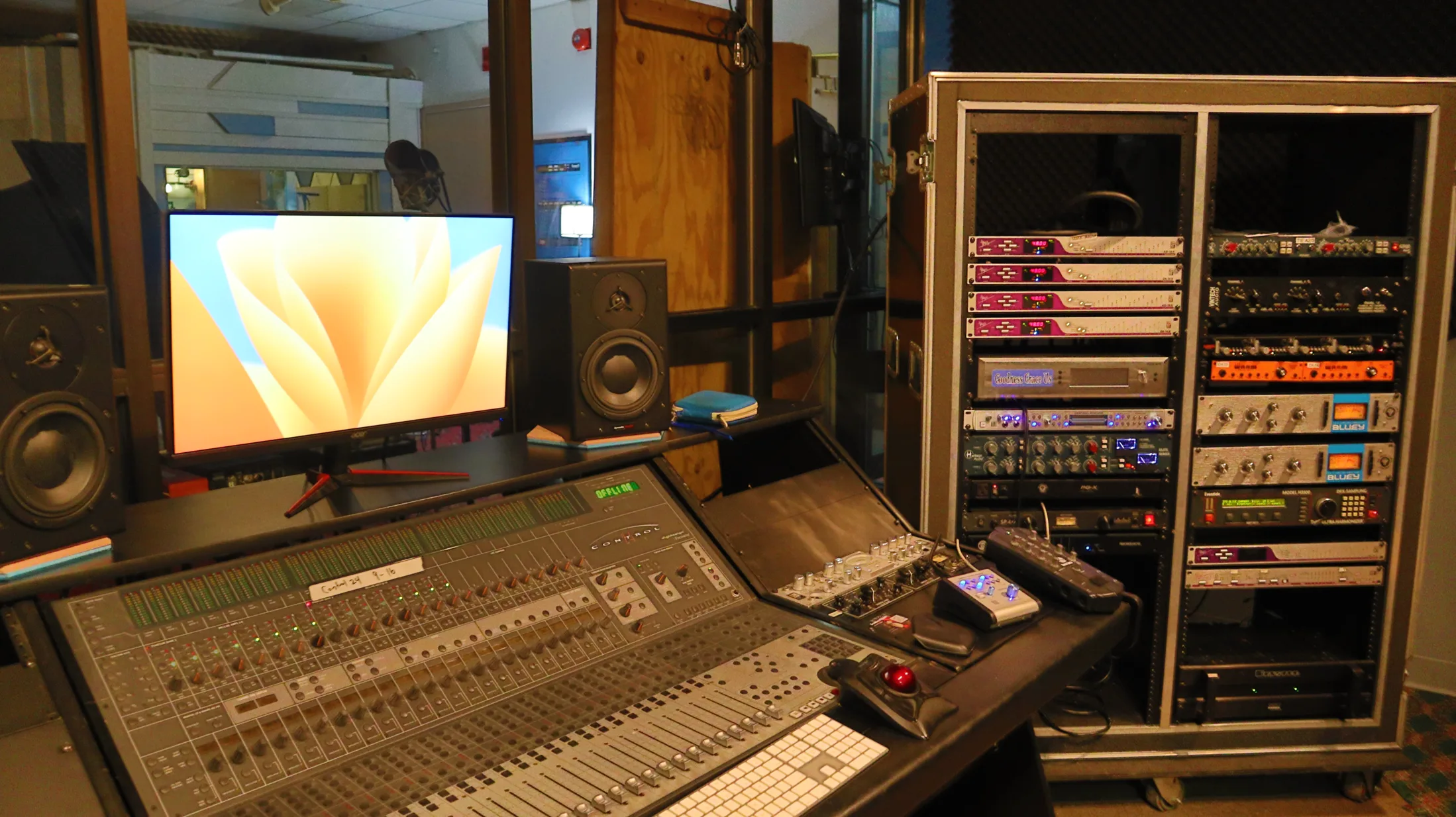 Mixing console, monitors, and rack equipment in the control room